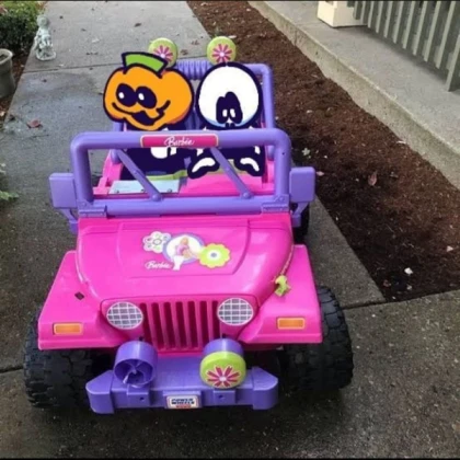 Skid and Pump driving a kid's car