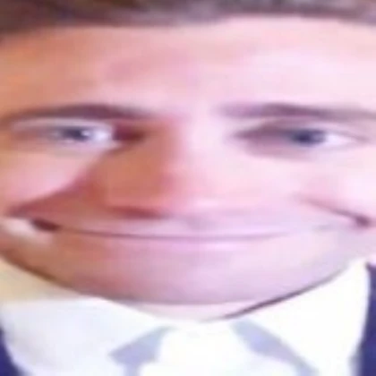 jake gyllenhaal wide smiling